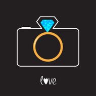 Photo camera and gold wedding ring lens Diamond flash Love