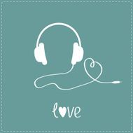 White headphones and cord in shape of heart Blue background