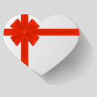 Heart-shaped gift with red bow