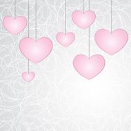 Seven hanging small pink laconic hearts