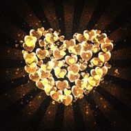 burning heart with sparkles on a dark background