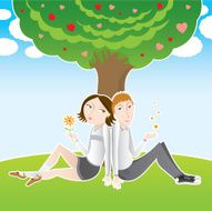 Ð¡ute couple under a tree