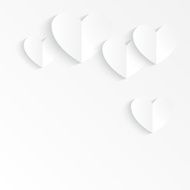 Paper hearts with shadows on white