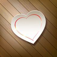 Valentine&#039;s Day Paper heart on a background of wood