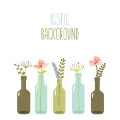 Rustic flowers in glass bottles