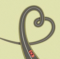 Road in shape of heart with red car
