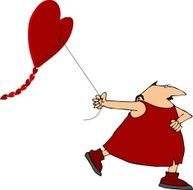 Flying a heart-shaped kite