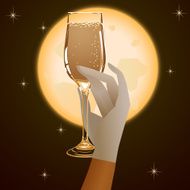 Hand holding a wineglass