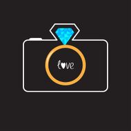 Photo camera with gold wedding ring lens Diamond flash Love