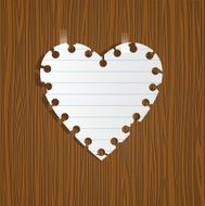 Paper heart on wooden background