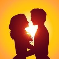 Sunset silhouettes of kissing couple N2