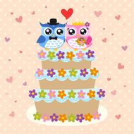 bird bride and groom on wedding cake