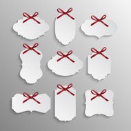 Set of beautiful retro labels with red gift bows