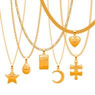 Set of golden chains with different pendants Precious necklaces