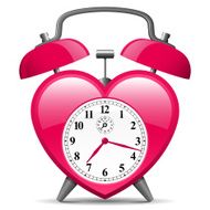 Classic alarm clock in heart shape