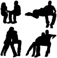 Cuddling couples sitting
