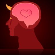 Devil head with heart inside