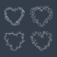 Hand drawn set of heart-shaped wreath on blackboard N2
