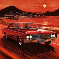 Couple Driving in Red Vintage Car