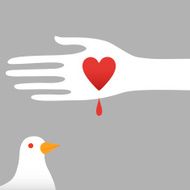 Love heart held in hand watched by Dove