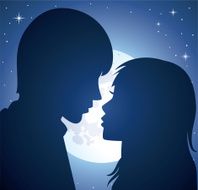 young man and woman in the light of a moon