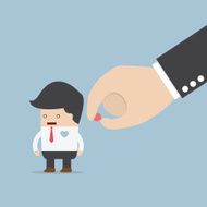 Hand giving heart to businessman