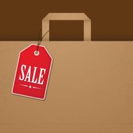 Brown paper bag with red sale tag