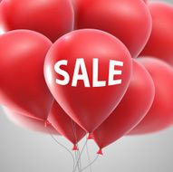 Sale label and flying balloon bunch