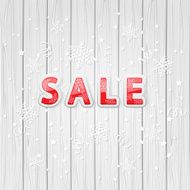 Sale on wooden background