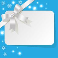 Gift Card with white ribbon on a blue background snowflakes
