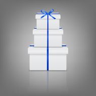 Stack of three realistic white gift boxes with blue ribbon
