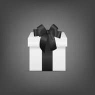 White square gift box with black ribbon and bow