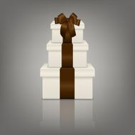 Stack of three realistic white gift boxes with brown ribbon N3