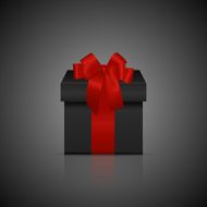 Black square gift box with red ribbon and bow