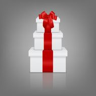 Stack of three realistic white gift boxes with red ribbon N3