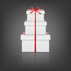 Stack of three realistic white gift boxes with red ribbon
