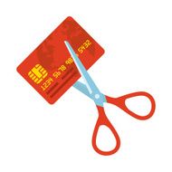 Red credit card and scissors