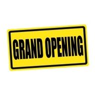 Grand opening black stamp text on yellow
