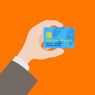 Hand holding the credit card