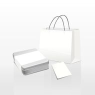 white paper bag and metal box