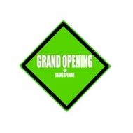 Grand opening white stamp text on green background
