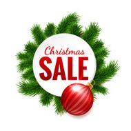 Christmas sale label on fir background
