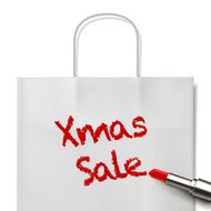 Xmas sale words written by red lipstick