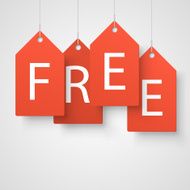 Four large orange tags with the word free