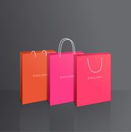 Colorful paper bags set isolated on grey background