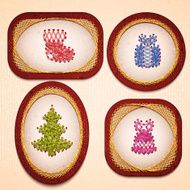 Vector badges with some Christmas elements embroidered on cardboard