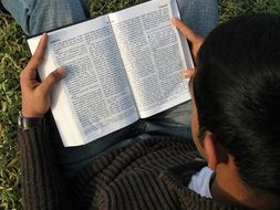 Bible in the hands of a man