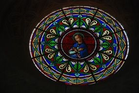 stained glass in a church with the virgin mary