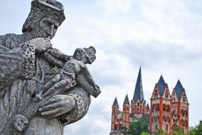 statue on the background of Limburg Cathedral