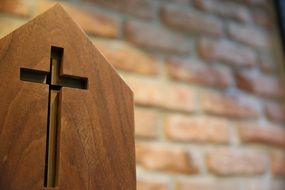 christian cross on a wooden panel